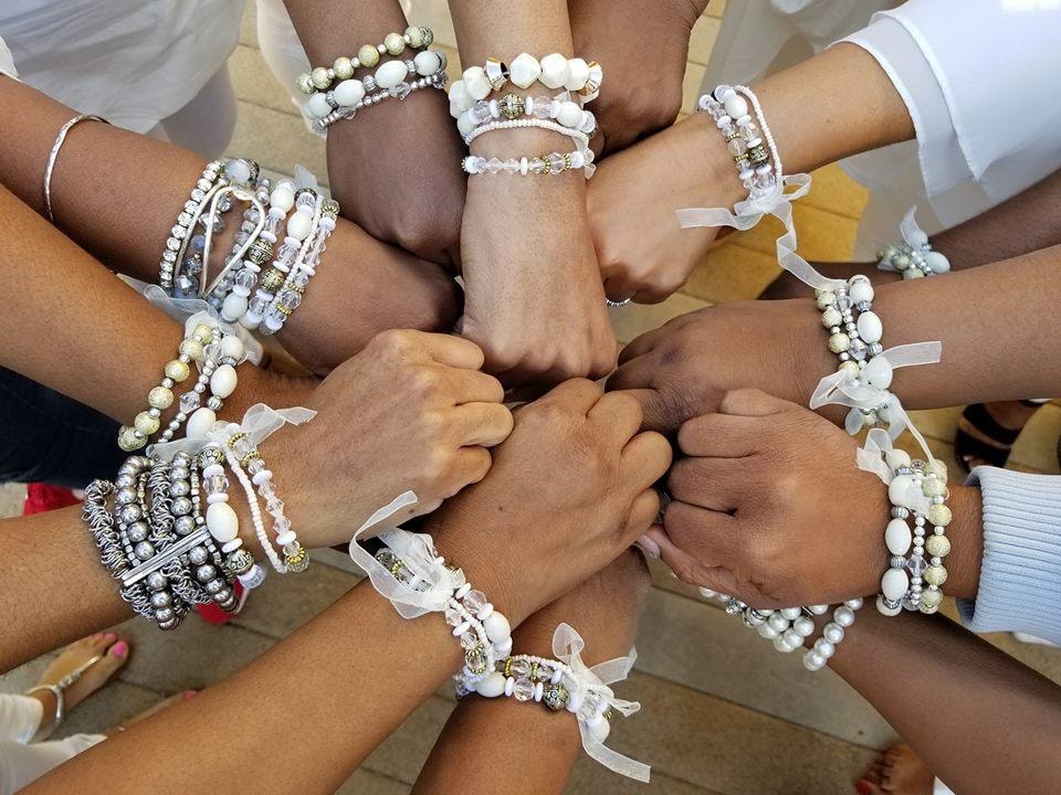 Sisters wearing beautiful beaded bracelets together